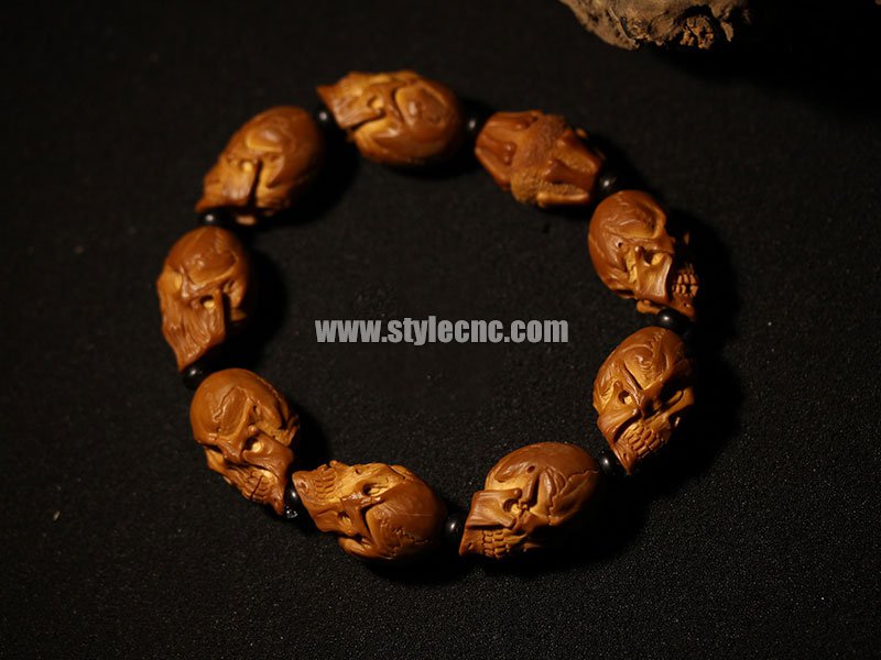 數控雕刻機在劣質橄欖核上雕刻